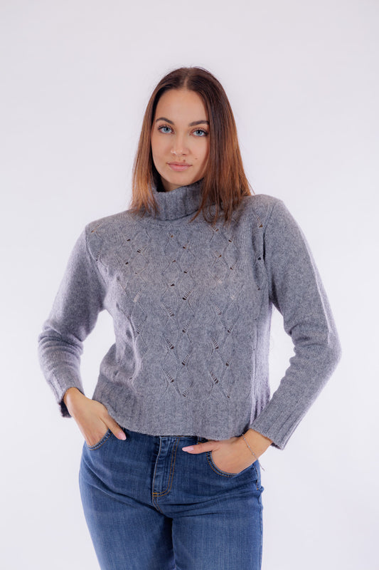 Maglia collo ciambella e trecce